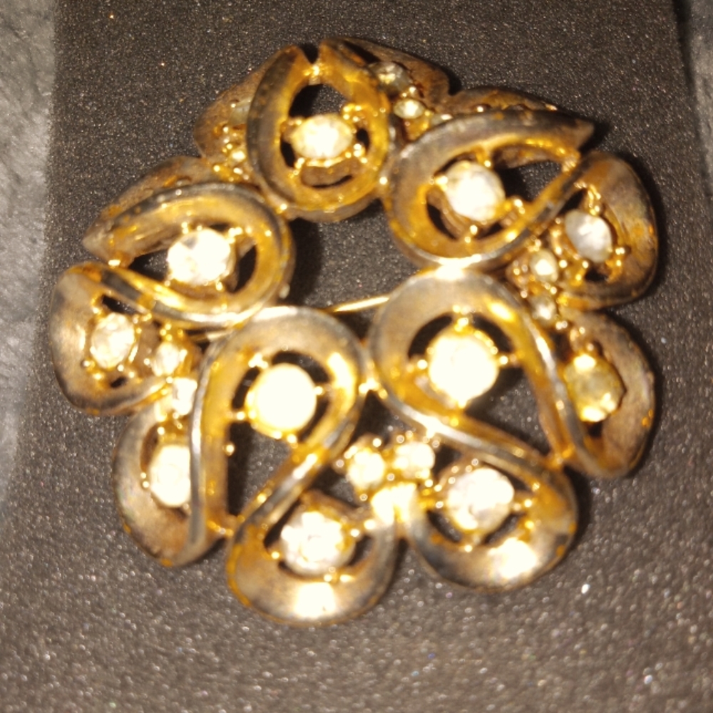 Large gold plated with crystals brooch